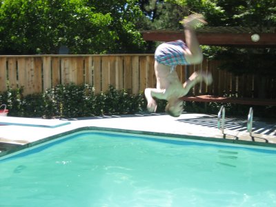 Little McCann doing a flip off the diving board